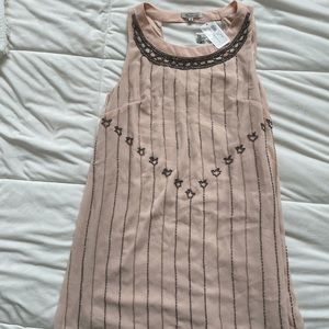 Size medium pink dress tags still on!